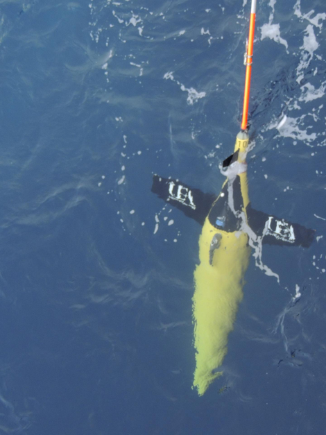 A Seaglider being deployed into the ocean.